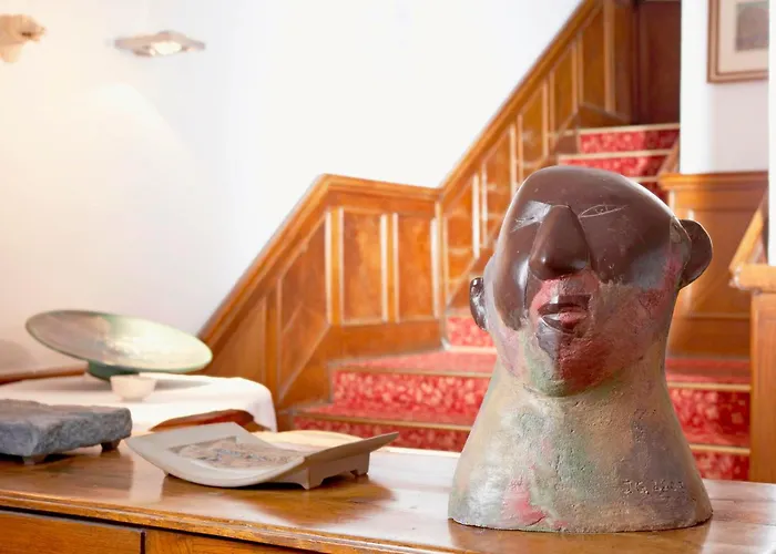 Keramikhotel Goldener Brunnen 3* גמונדן